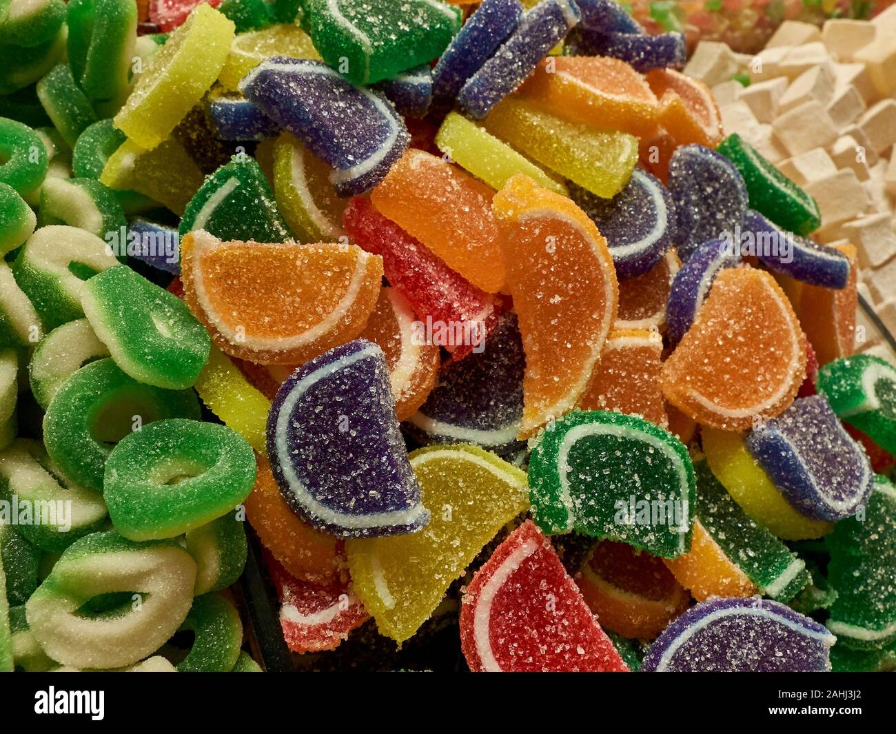 Jelly fruits and traditional turkish delight sweets at market counter