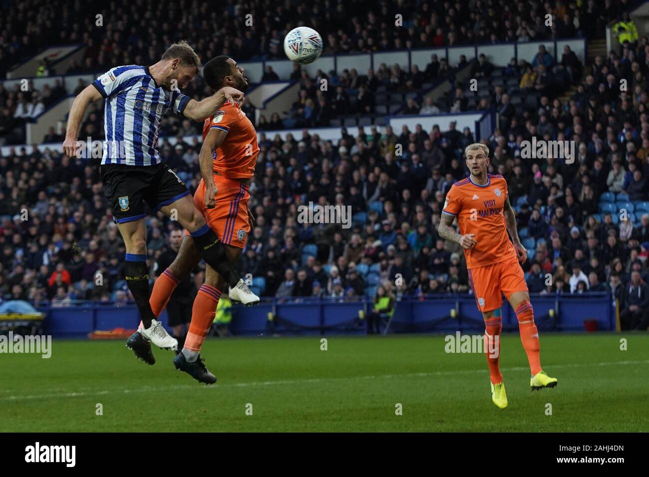 29th December 2019, Hillsborough, Sheffield, England; Sky Bet Championship, Sheffield Wednesday v Cardiff City : Tom Lees (15) of Sheffield Wednesday heads the ball into the back of the net to make it 2-1  Credit: Kurt Fairhurst/News Images Stock Photo