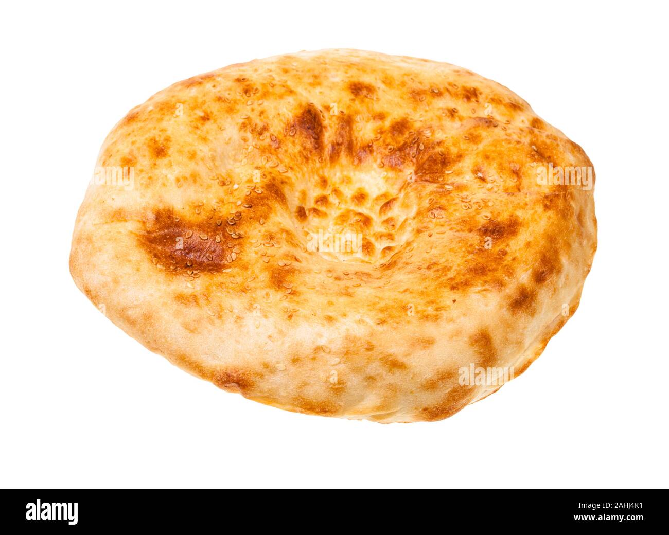 freshly baked tandoor uzbek bread (Obi non) isolated on white background Stock Photo