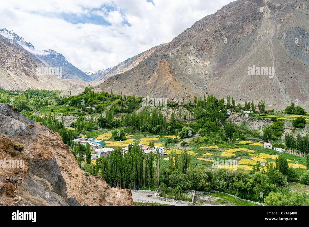 Skardu Satpara Valley Panoramic Picturesque View of a Village and Landscape on a Sunny Blue Sky Day Stock Photo