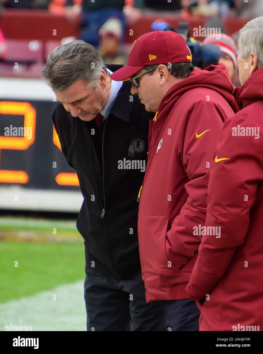 Washington Redskins team president Bruce Allen, left and owner Daniel M. Snyder, right, converse prior to the game against the Philadelphia Eagles at FedEx Field in Landover, Maryland on December 30, 2018.Credit: Ron Sachs/CNP | usage worldwide Stock Photo