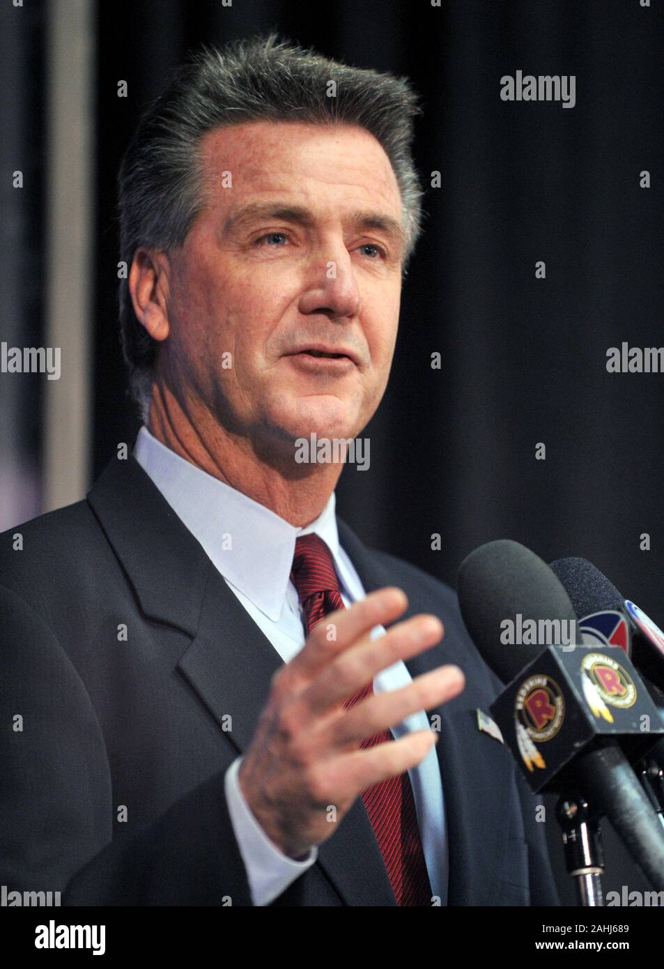 Ashburn, VA - January 6, 2010 -- Washington Redskins executive vice president/general manager Bruce Allen introduces Mike Shanahan, new head coach of the Washington Redskins at a press conference at Redskins Park in Ashburn Virginia on Wednesday, January 6, 2010.Credit: Ron Sachs/CNP | usage worldwide Stock Photo