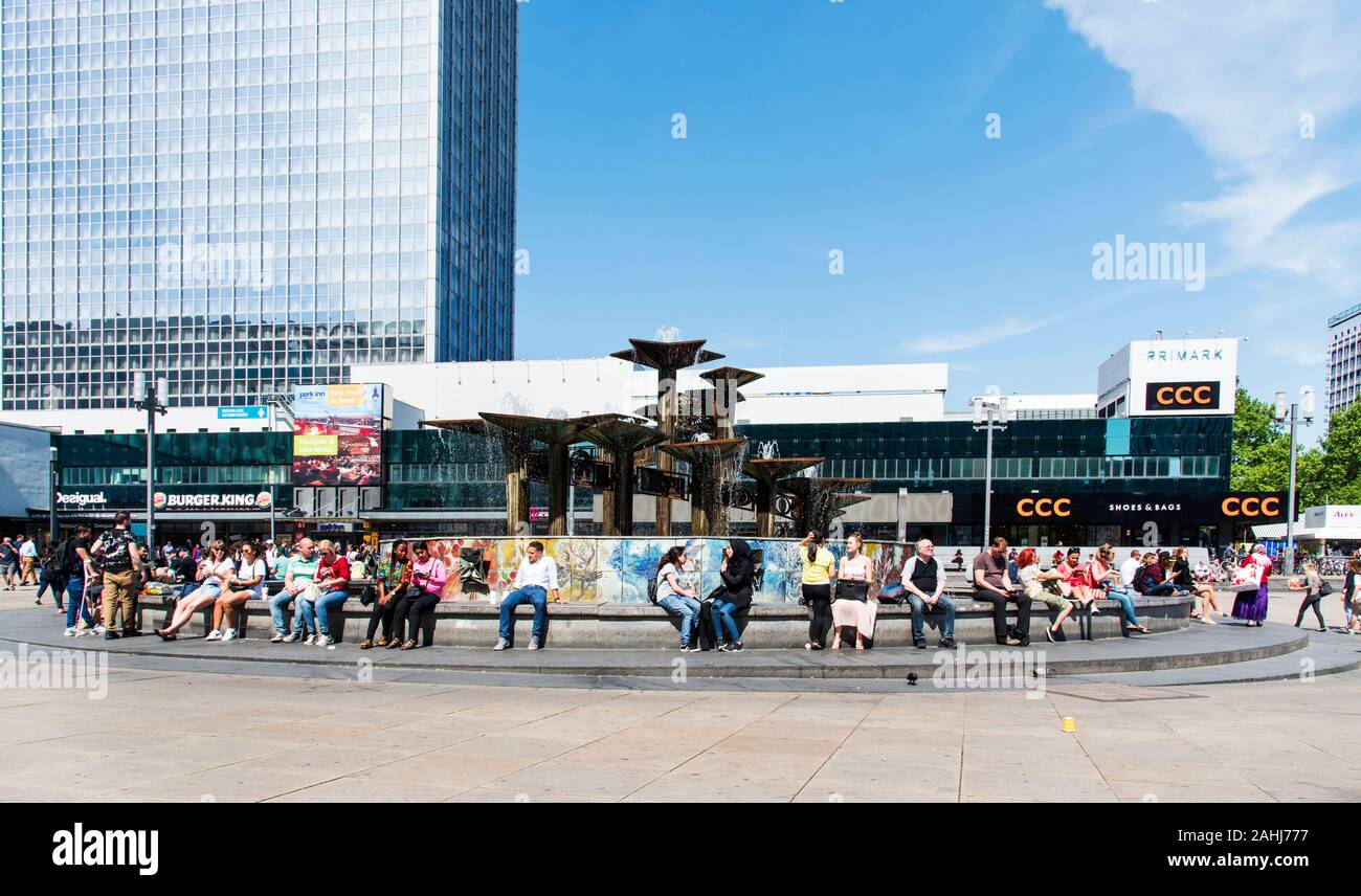 BERLIN, GERMANY - MAY 24, 2018: A view of the Alexanderplatz square, a busy public pedestrian square in Berlin, Germany, with the Brunnen der Volkerfr Stock Photo