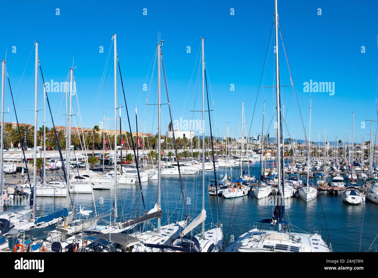 BARCELONA, SPAIN - DECEMBER 22, 2019: A view over the Port Olimpic marina in Barcelona, Spain, built in 1991 to host the sailing events for the 1992 S Stock Photo