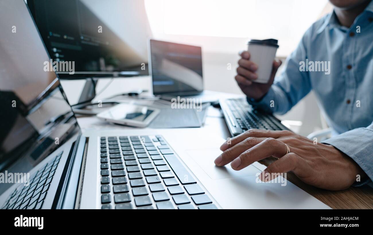 Programmer Typing Code on desktop computer, Developing programming and ...