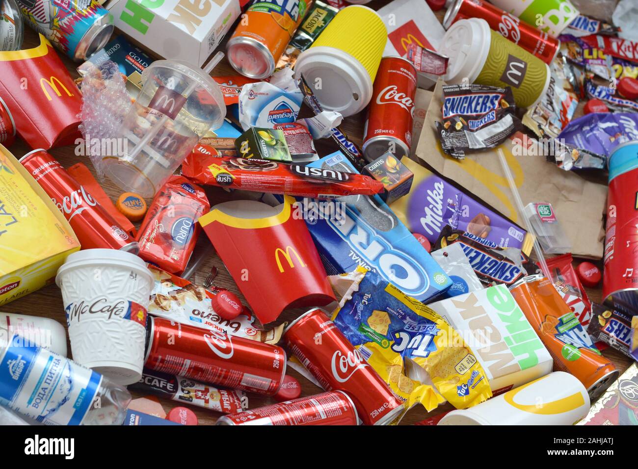 Garbage Processed Snacks NY, USA - DECEMBER 25, 2019: Big pile of many disposable colored trash ...