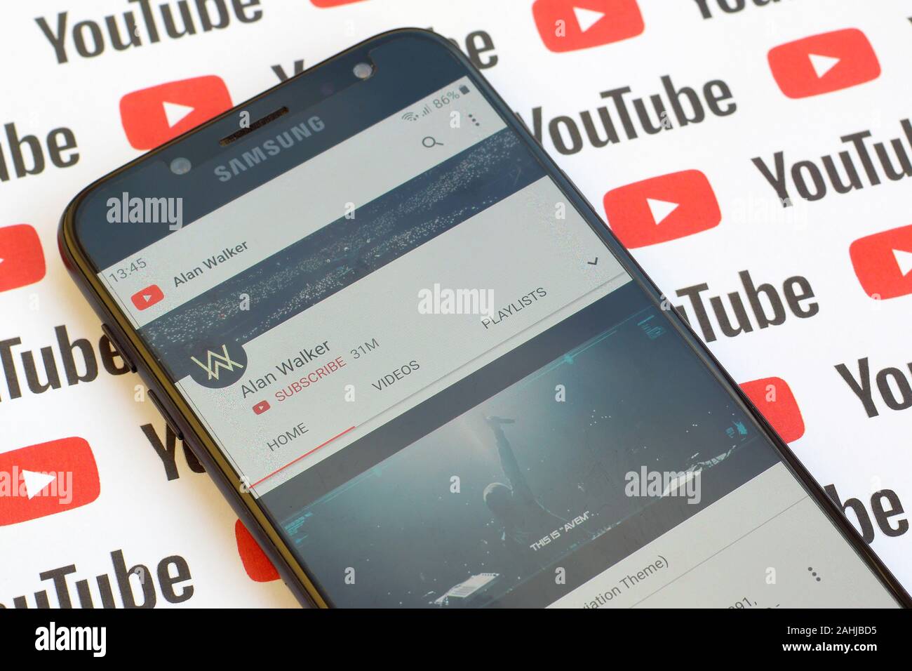 NY, USA - DECEMBER 4, 2019: Alan Walker official youtube channel on  smartphone screen on paper youtube background Stock Photo - Alamy