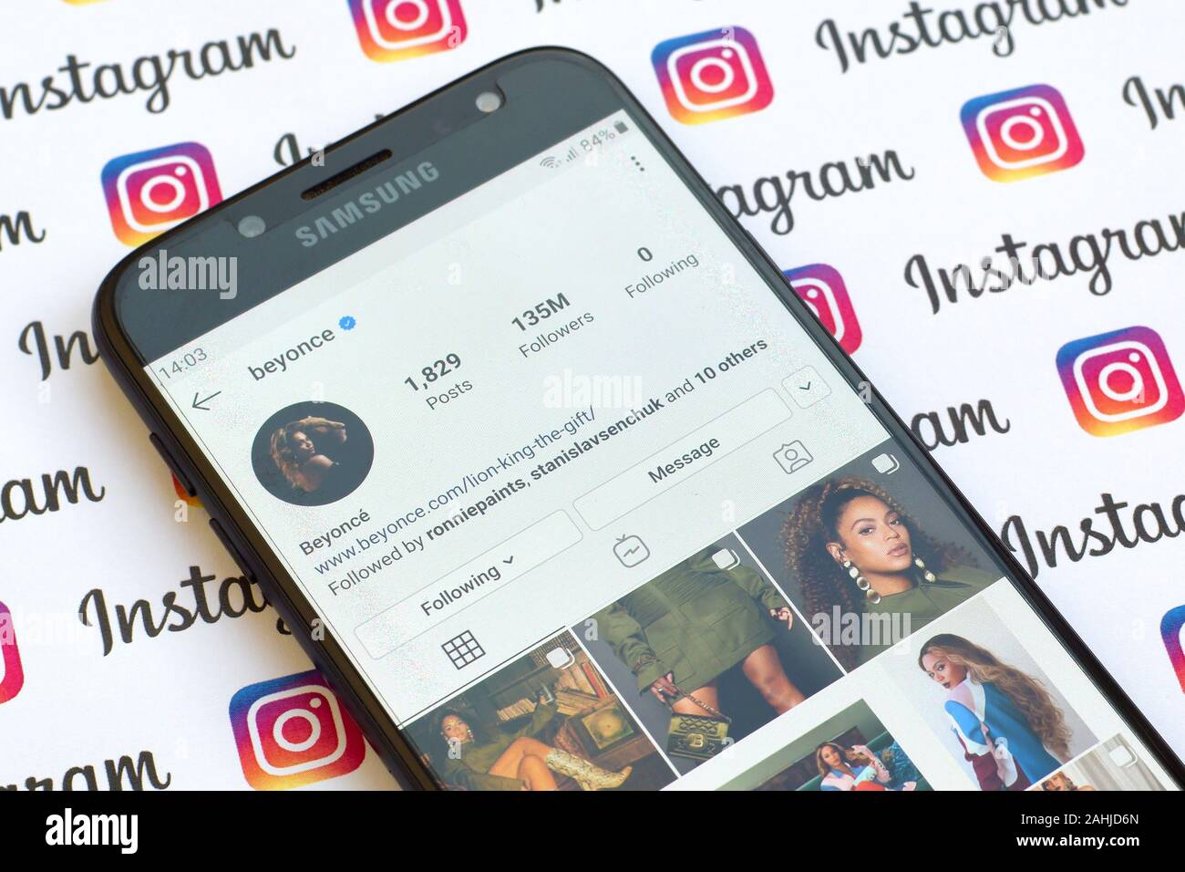 NY, USA - DECEMBER 4, 2019: Beyonce official instagram account on smartphone screen on paper instagram banner. Stock Photo
