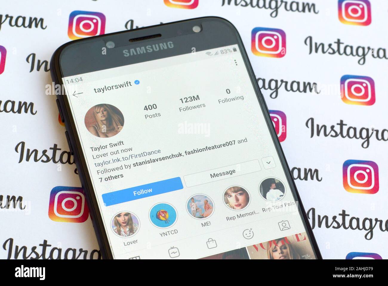 NY, USA - DECEMBER 4, 2019: Taylor Swift official instagram account on smartphone screen on paper instagram banner. Stock Photo