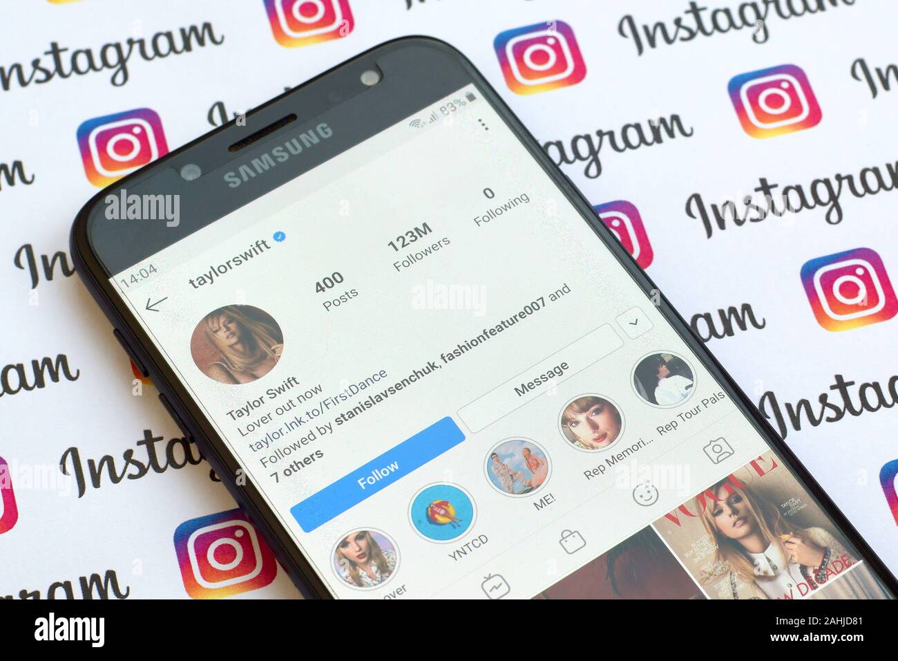 NY, USA - DECEMBER 4, 2019: Taylor Swift official instagram account on smartphone screen on paper instagram banner. Stock Photo