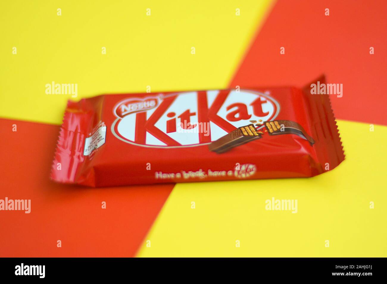 NY, USA - DECEMBER 4, 2019: Kit Kat chocolate bars in red wrapping lies ...