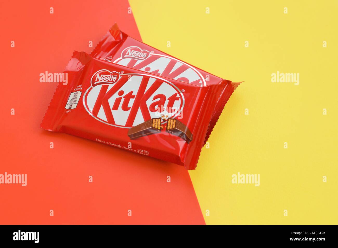 NY, USA - DECEMBER 4, 2019: Kit Kat chocolate bars in red wrapping lies ...