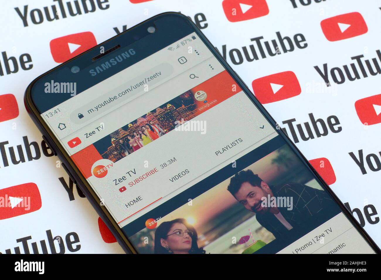 NY, USA - DECEMBER 4, 2019: Zee TV official youtube channel on smartphone screen on paper youtube background. Stock Photo