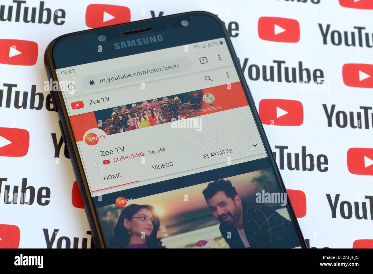 NY, USA - DECEMBER 4, 2019: Zee TV official youtube channel on smartphone screen on paper youtube background. Stock Photo