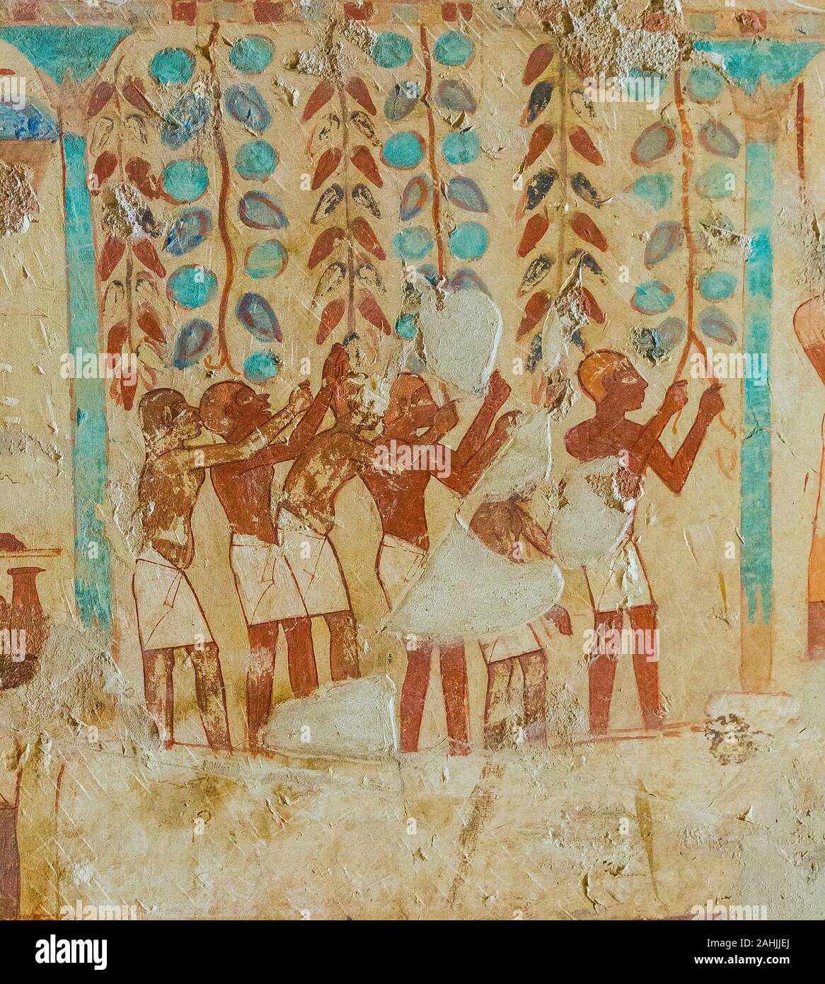 Thebes in Egypt, Valley of the Nobles, tomb of Userhat (TT 56). Treading of grapes in a large vat. Stock Photo