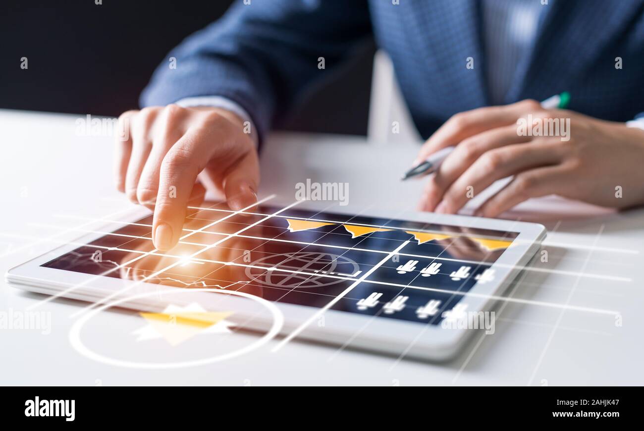 Businessman hands using tablet computer. Digital marketing media or financial diagrams in virtual screen. 3D chart floating above digital tablet compu Stock Photo