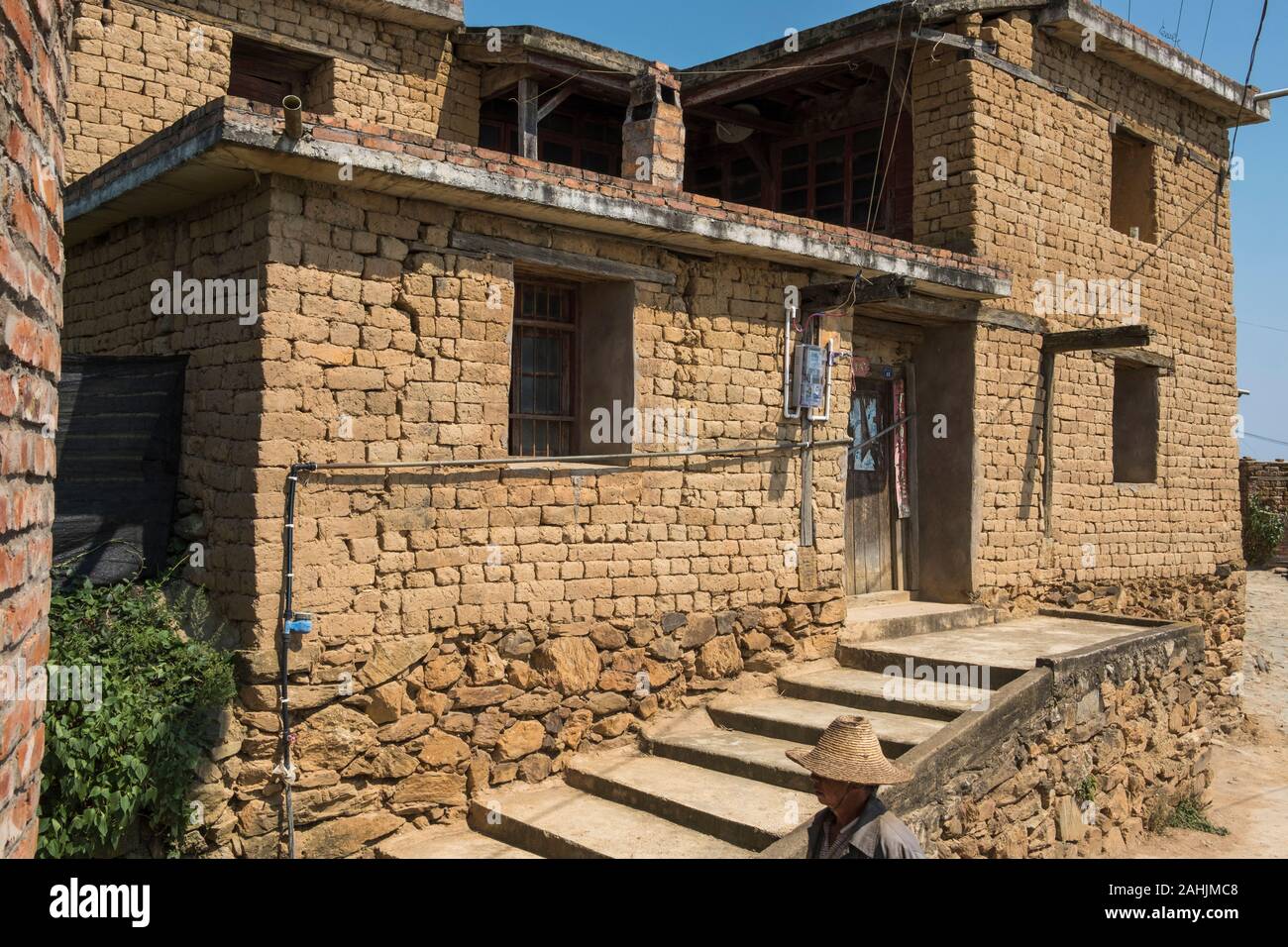 Traditional dwellings of the Yi ethnic group in Cangtai village, Honghe, Yunnan, China. 29-Sep-2019 Stock Photo