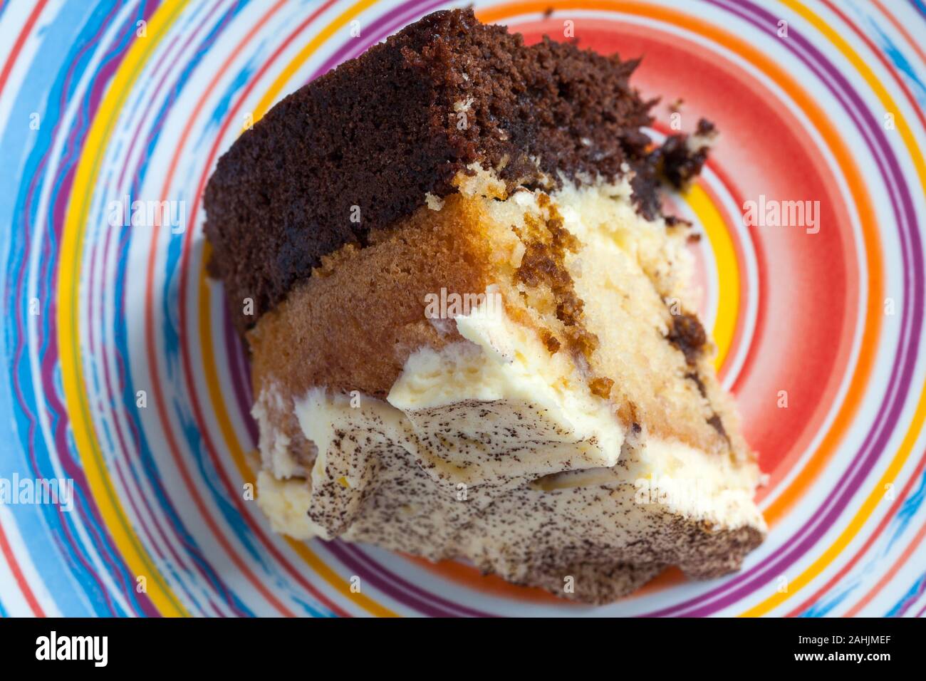 Slice Of M S Tiramisu Cake Set On Colourful Plate Stock Photo Alamy