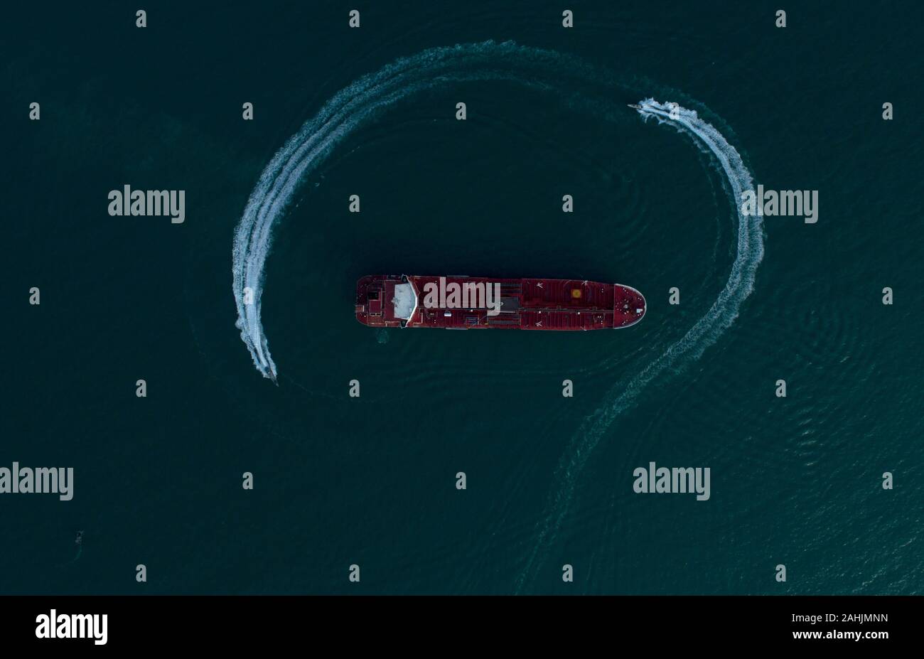 (191230) -- BEIJING, Dec. 30, 2019 (Xinhua) -- The photo released on July 21, 2019 shows the British oil tanker 'Stena Impero' surrounded by speedboats of Iran's Islamic Revolution Guard Corps (IRGC) in the Strait of Hormuz, Iran. Two hot potatoes in the chaotic Middle East   Under 'maximum pressure' from the United States, Iran has since May gradually stopped implementing parts of its commitment to the 2015 nuclear deal, also known as the Joint Comprehensive Plan of Action. In the meantime, a number of oil tankers have been attacked or detained in the Gulf and a U.S. drone was shot down. The Stock Photo