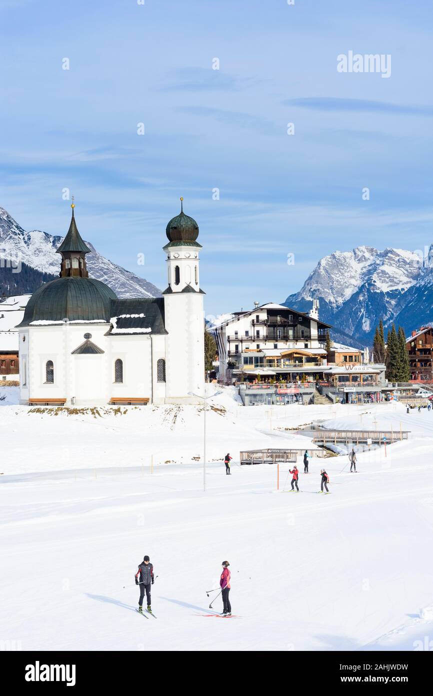 Seefeld in Tirol: church Seekirche, cross-country skiing piste, mountain Karwendel in Olympiaregion Seefeld, Tirol, Tyrol, Austria Stock Photo