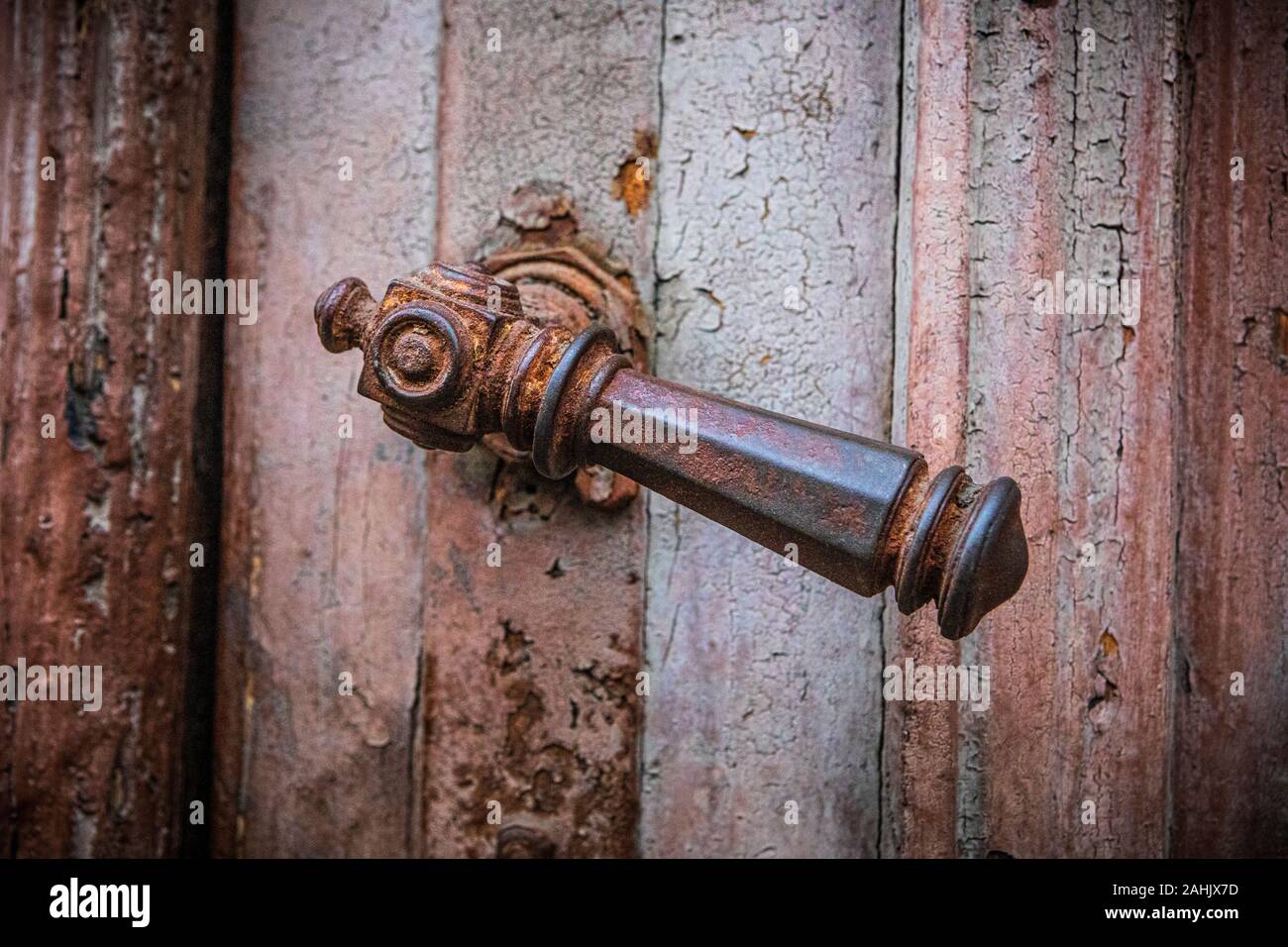 An old rusty door handle in Brasov, Romania. Stock Photo