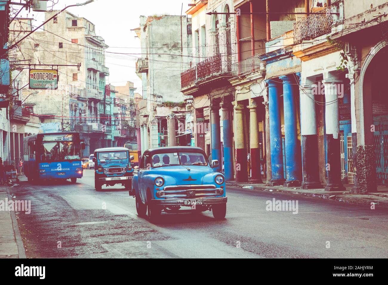 HAVANA, CUBA - DECEMBER 10, 2019: Vintage colored classic american cars in Old Havana, Cuba. Stock Photo