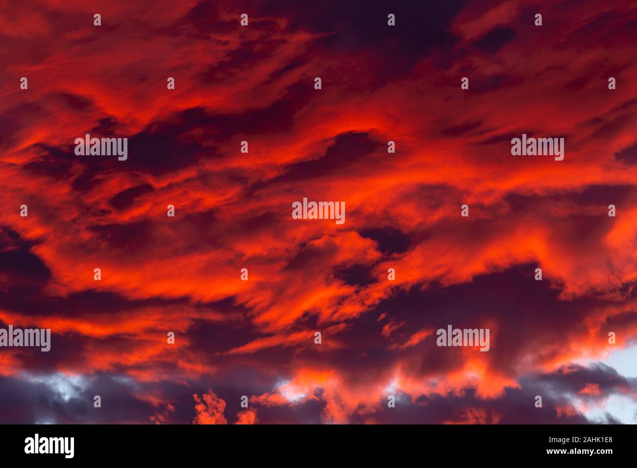 Dramatic red clouds - beautiful colorful sunset Stock Photo