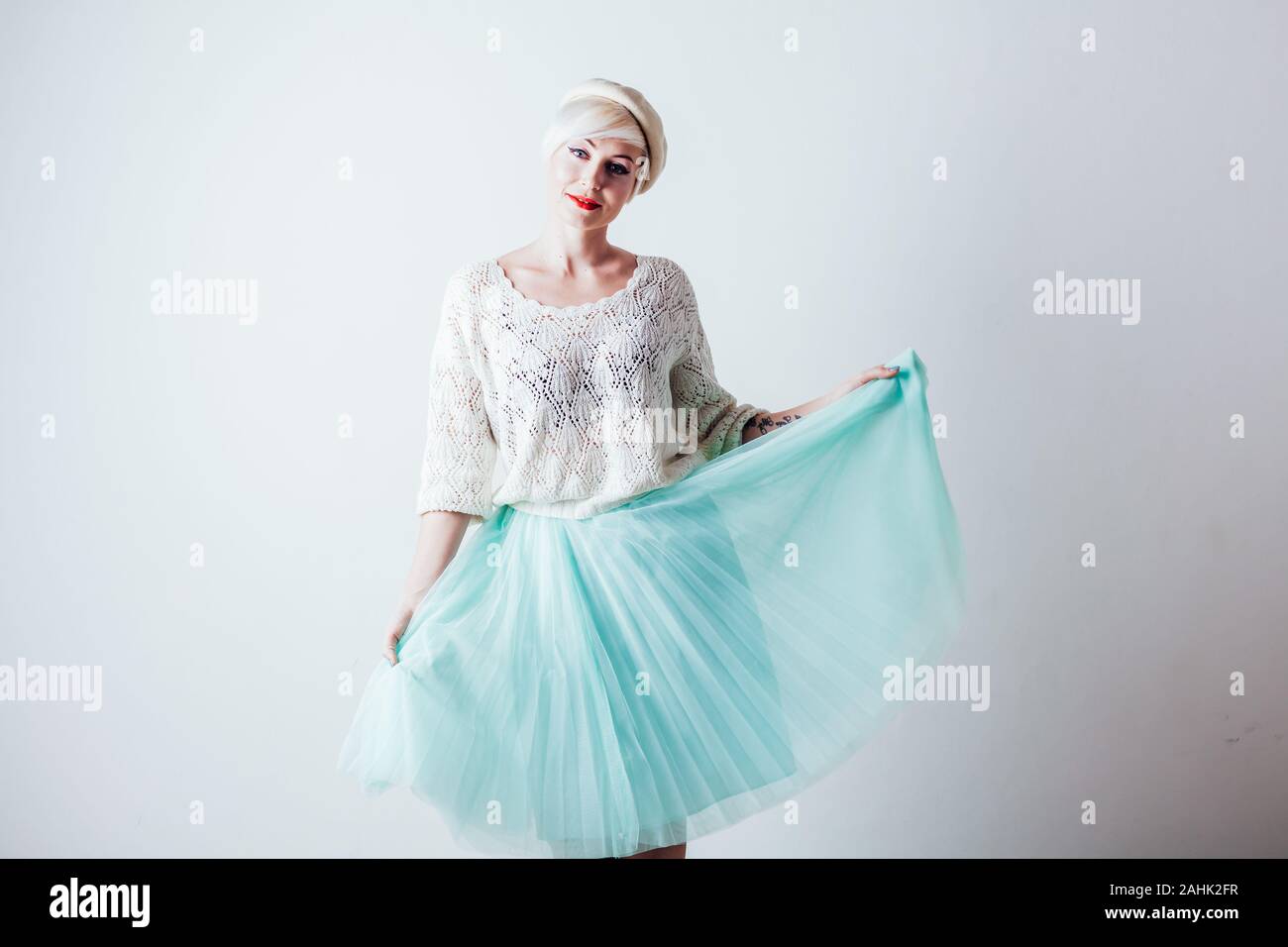 Portrait of a beautiful girl posing on a white background Stock Photo ...