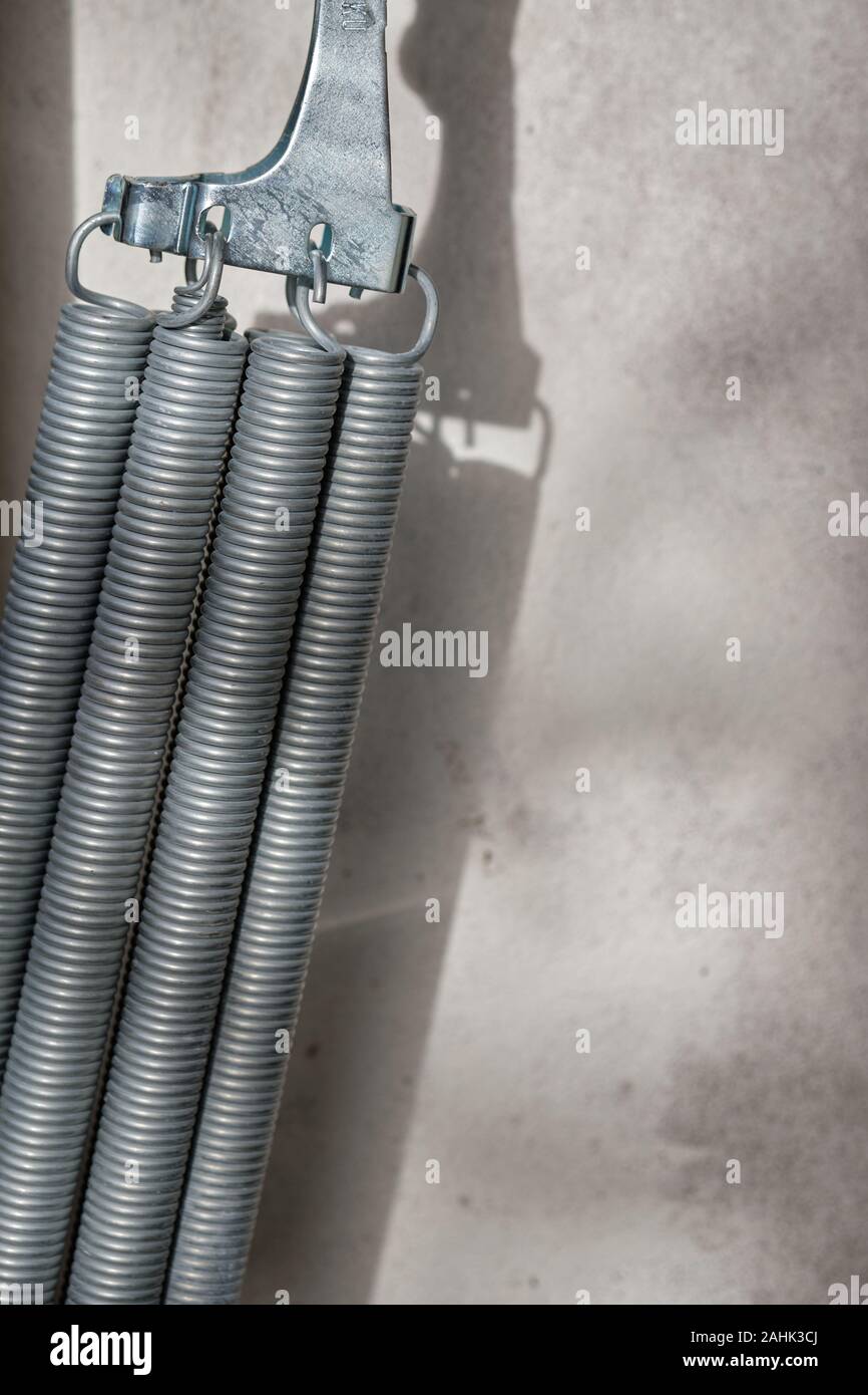 Some strong springs holding the garage door in the right place Stock Photo
