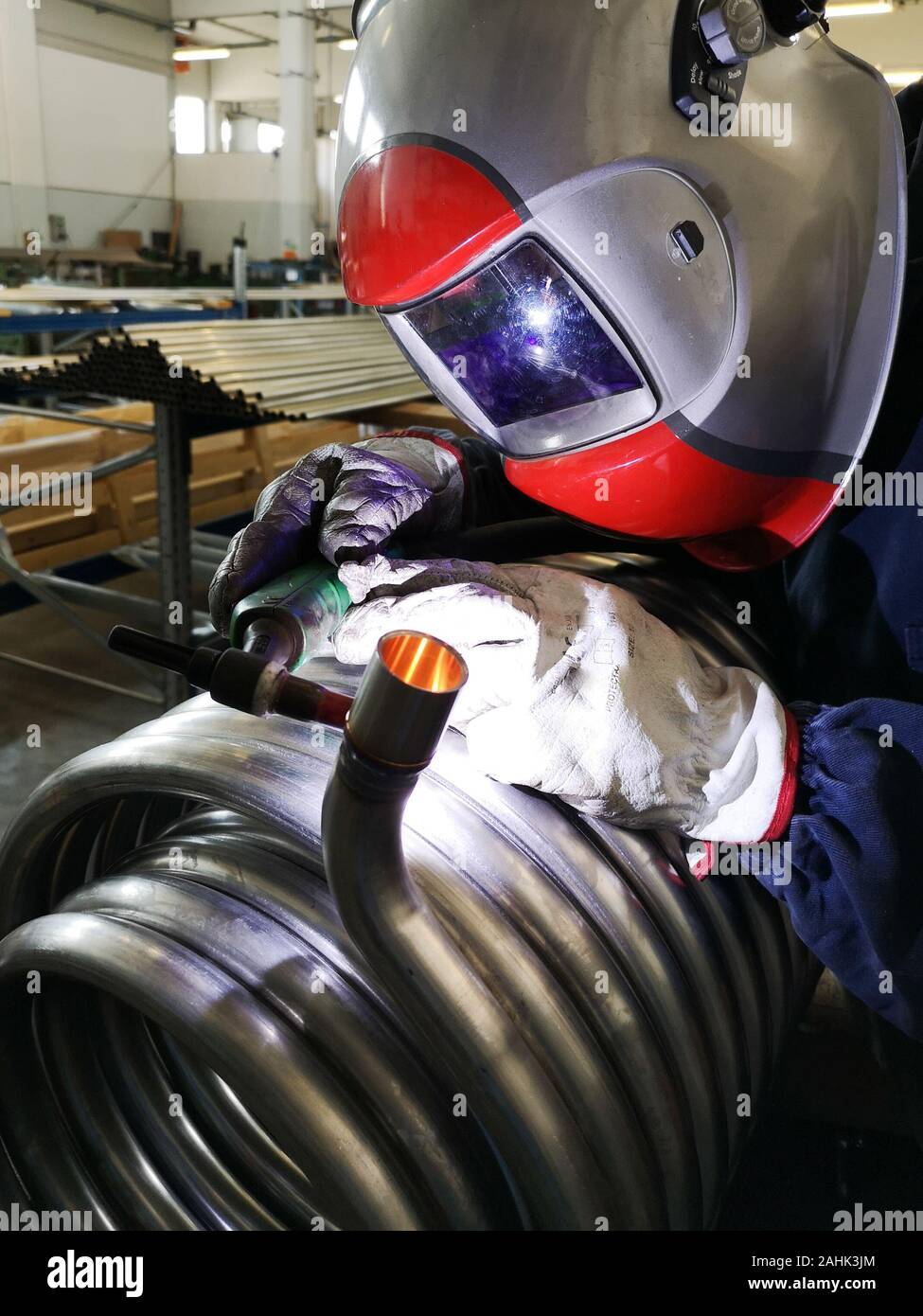 Manual tig welding in an engineering industry Stock Photo Alamy