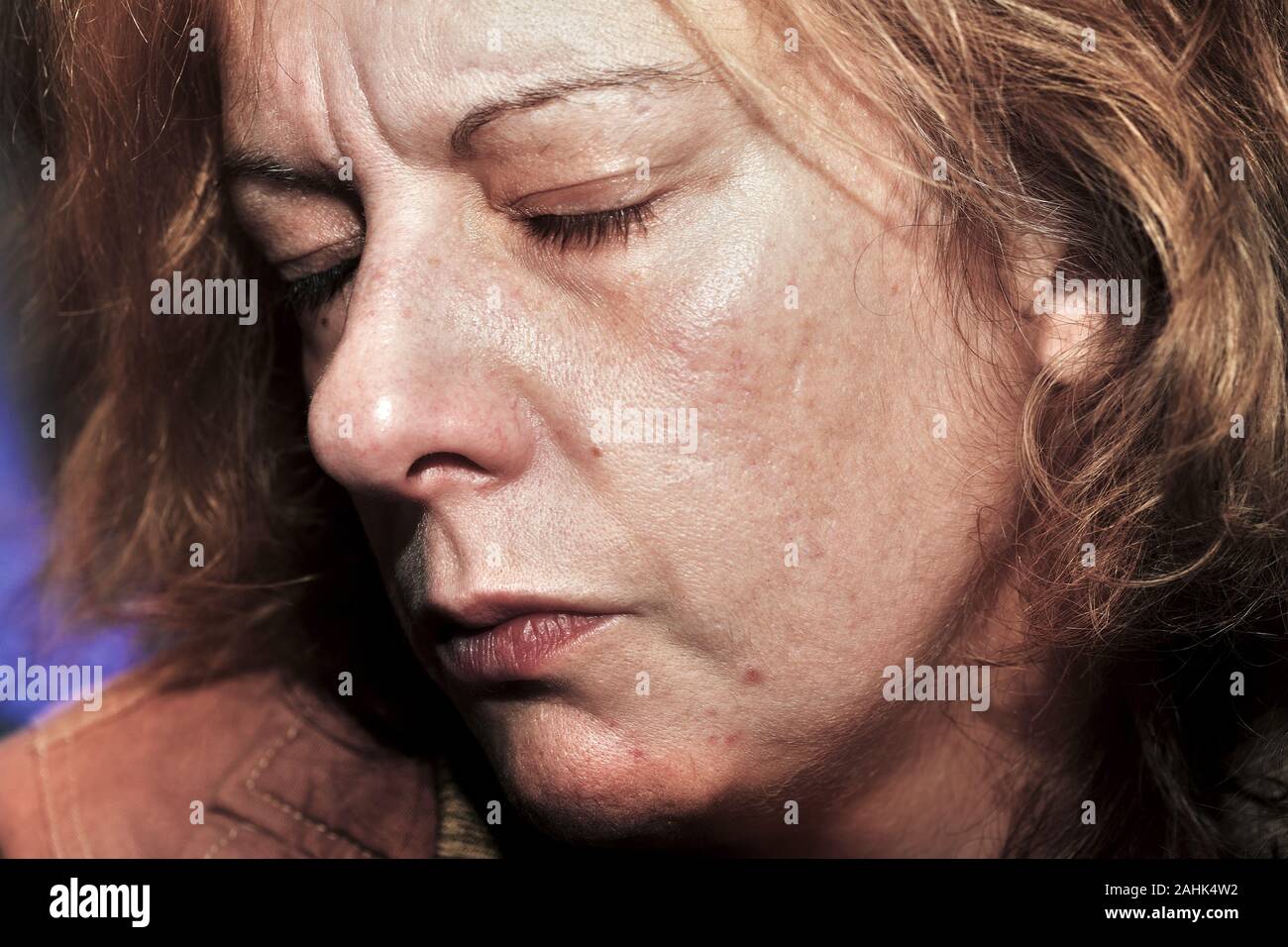 Alcoholic woman with severe depression. Stock Photo