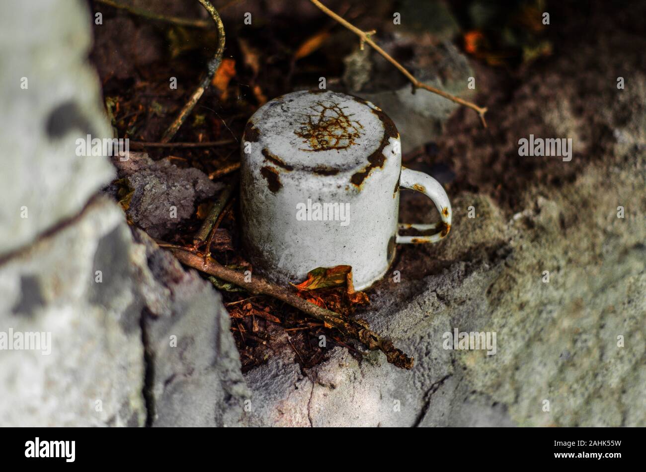 Very Old Rusted Cups old enameled cup in a forgotten place Stock Photo - Alamy