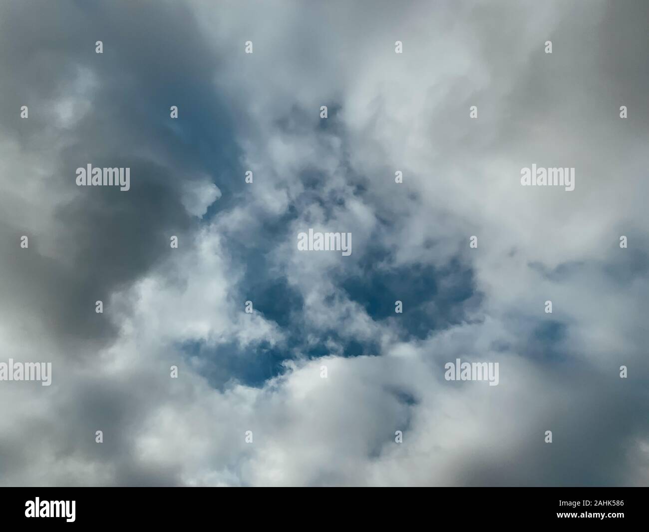 blue sky with white gray clouds nature as background Stock Photo - Alamy