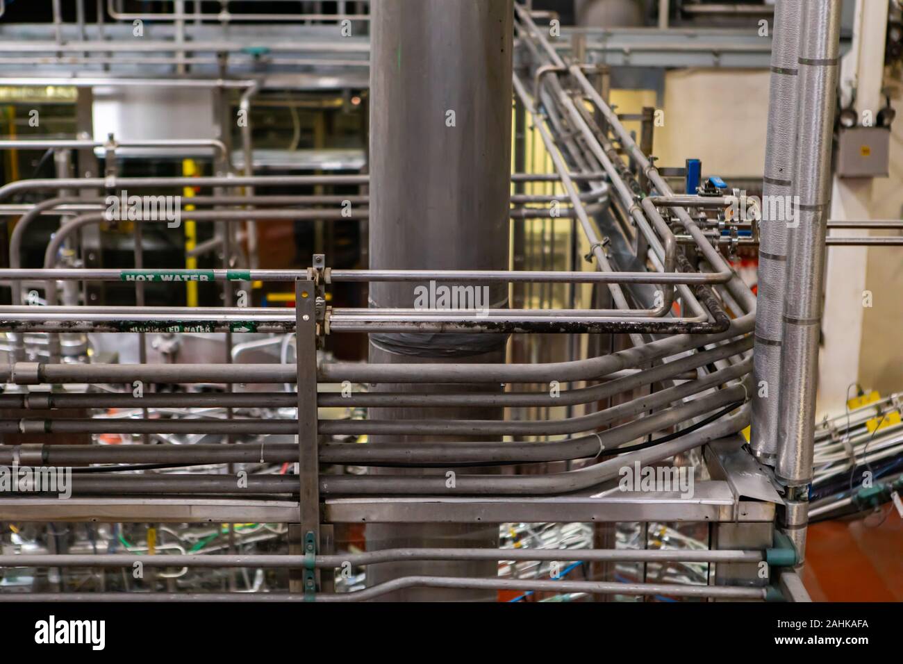 a complicated piping system, hot water metallic pipes with wires