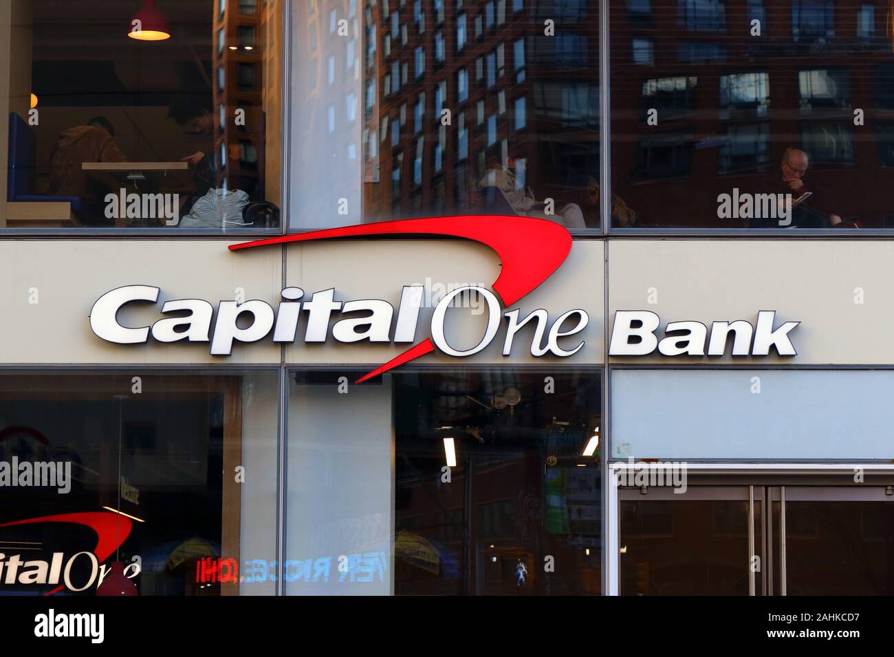 The Capital One bank logo on a glass building in the Union Square neighborhood of Manhattan, New York, NY. Stock Photo