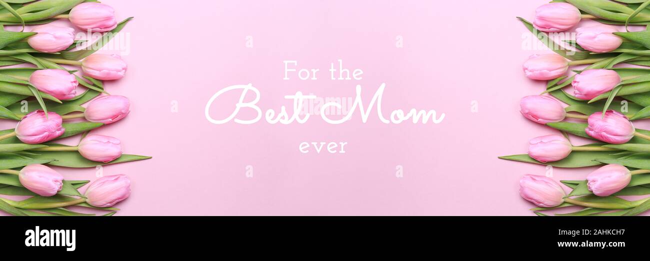 https://c8.alamy.com/comp/2AHKCH7/for-the-best-mom-ever-wording-with-pink-tulips-on-the-pink-background-flat-lay-top-view-mothers-day-holiday-celebration-card-horizontal-banner-format-2AHKCH7.jpg