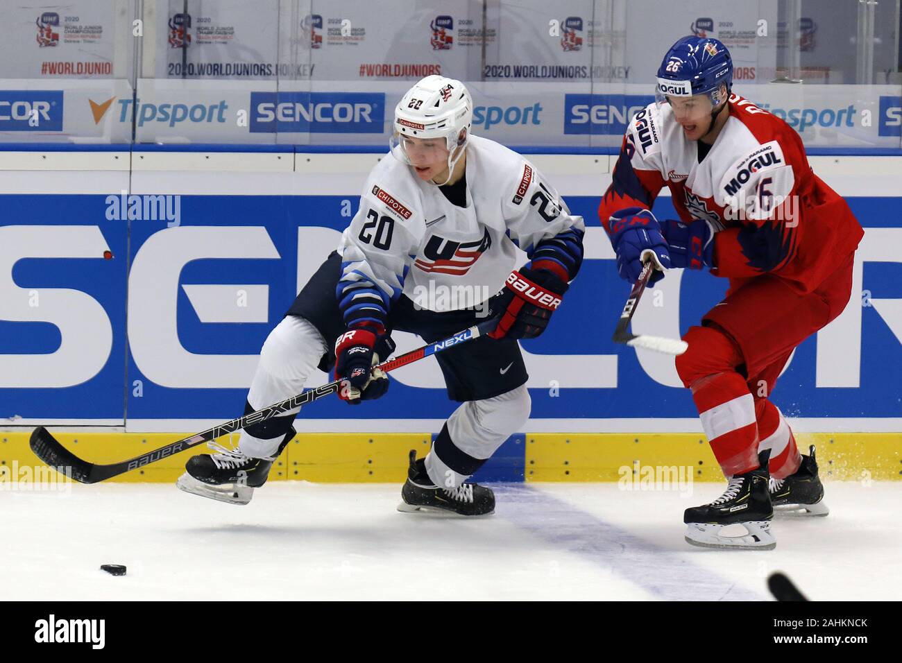L-R Parker Ford (USA) and Adam Raska (CZE) in action during the 2020 IIHF World Junior Ice Hockey Championships Group B match between USA and Czech Re Stock Photo