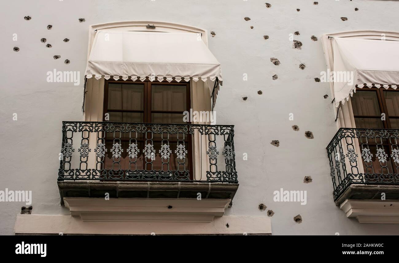 House and Museum of Serdan brothers, Puebla, Mexico showing bullet holes from the Mexican Revolution Stock Photo