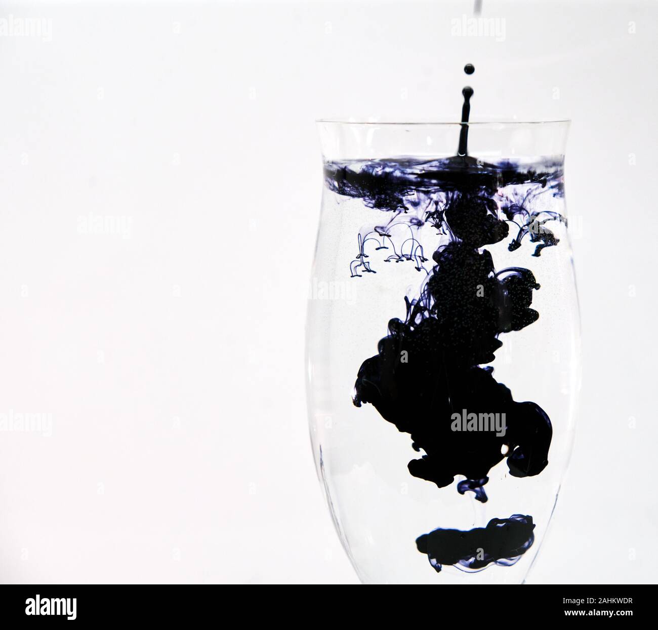 Dropping Ink Dropping paint hi-res stock photography and images - Alamy