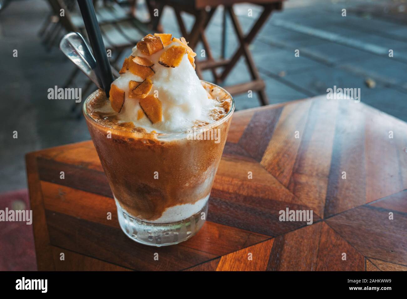 A Vietnamese-style coconut iced coffee, served at a streetside cafe in Hanoi, Vietnam Stock Photo