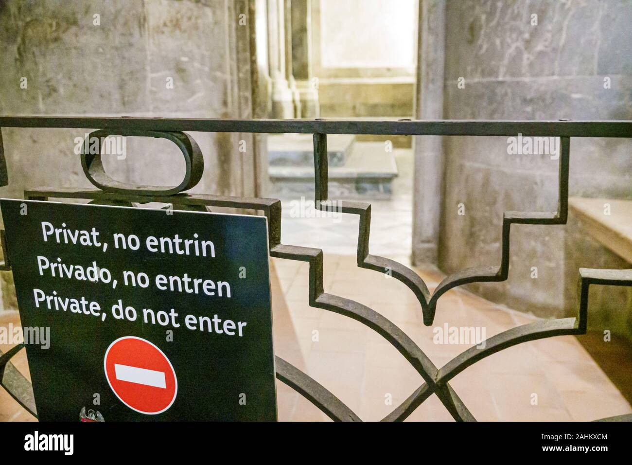 Tarragona Spain Hispanic Catalonia Metropolitan Cathedral Basilica,Catedral Basilica,Catholic church,inside,private area,sign,no entry,Catalan,English Stock Photo