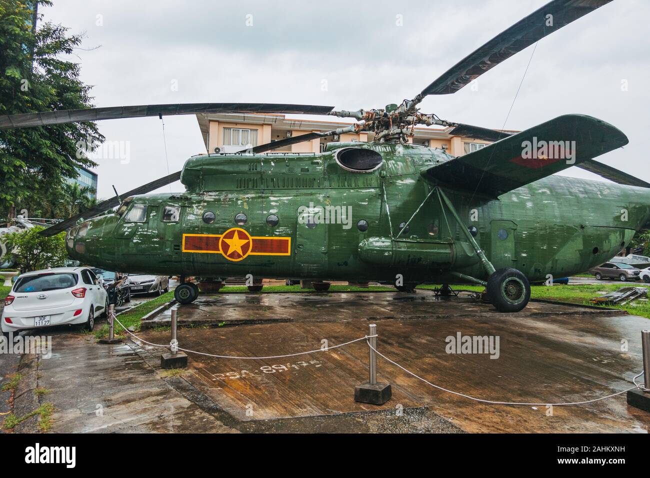 A huge Mil Mi6 Hook-A military transport helicopter dwarfs cars in the rear  carpark of the Vietnam People's Air Force Museum, Hanoi, Vietnam Stock  Photo - Alamy