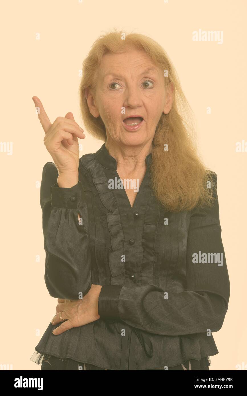 Aged woman pointing finger copy hi-res stock photography and images - Alamy