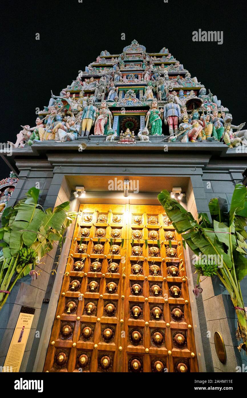 SINGAPORE - CIRCA APRIL, 2019: view of large double-leaf timber doors at Sri Mariamman Temple, Singapore's oldest Hindu temple. Stock Photo