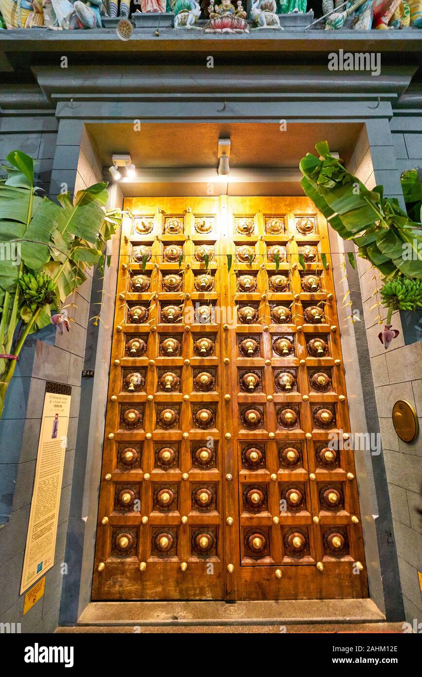 SINGAPORE - CIRCA APRIL, 2019: view of large double-leaf timber doors at Sri Mariamman Temple, Singapore's oldest Hindu temple Stock Photo