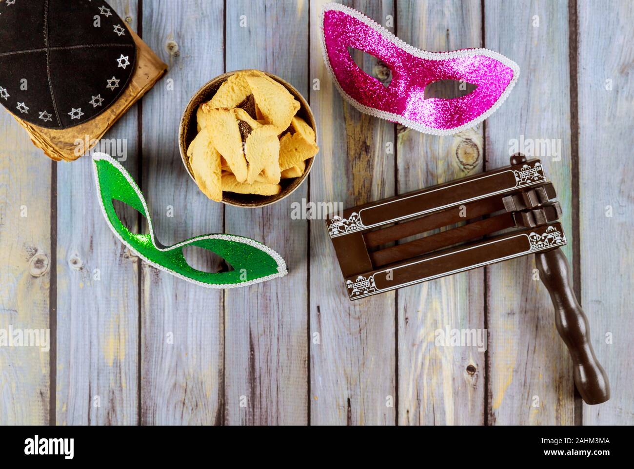 Hamantaschen hamans ears cookies Purim celebration jewish holiday bright party tools and decoration Stock Photo