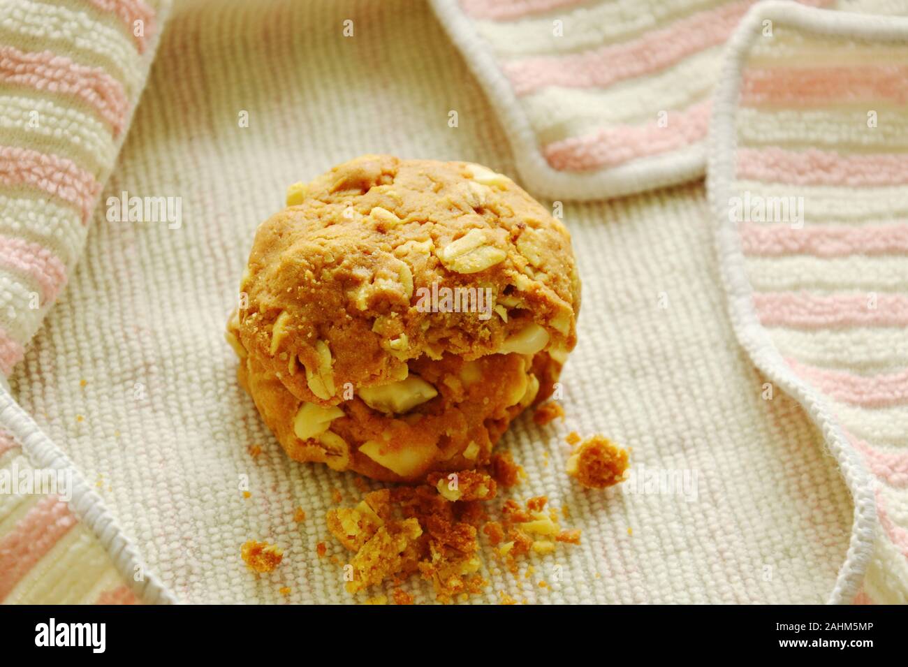 cereal butter cookie bite on cloth Stock Photo