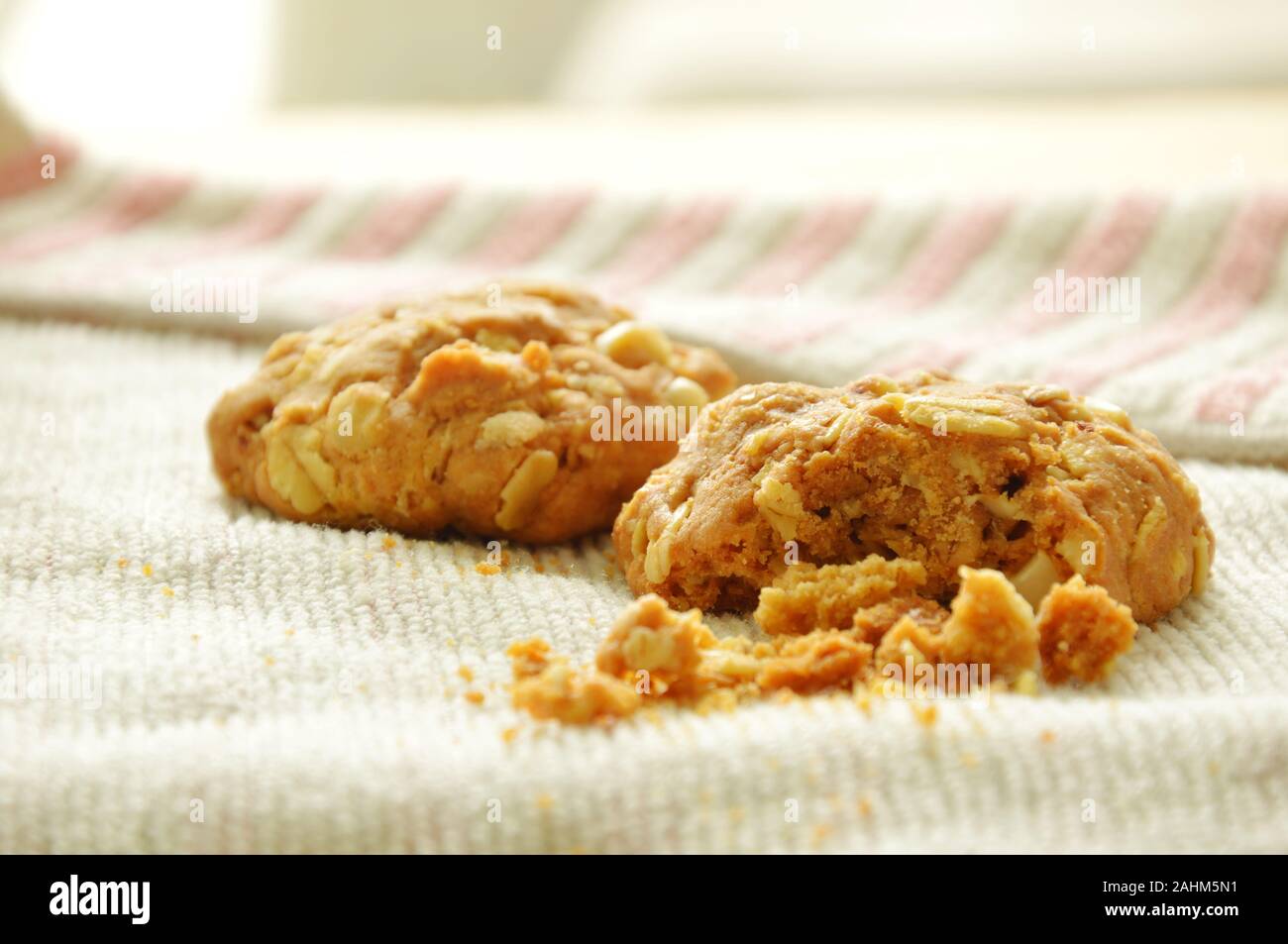cereal butter cookie bite on cloth Stock Photo