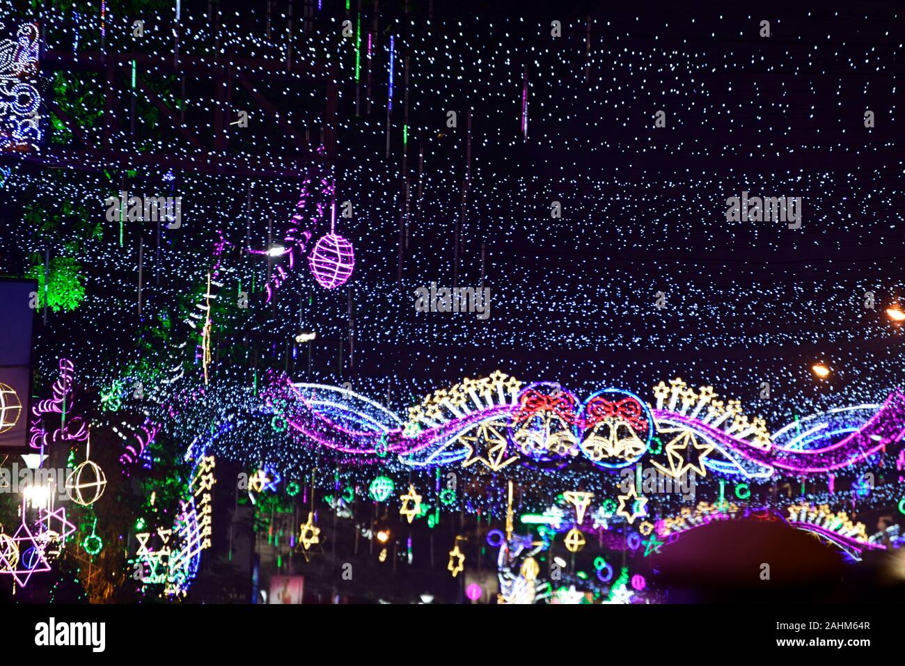 Christmas lights decoration at Park street, Kolkata and lots of people walking during the Christmas Stock Photo