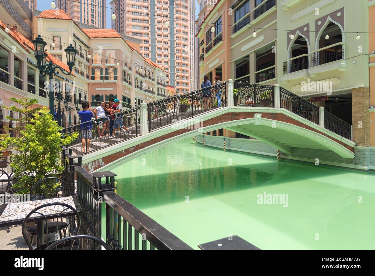 Manila, Philippines - August 10, 2017: Bridge over artificial river in Venice piazza Stock Photo